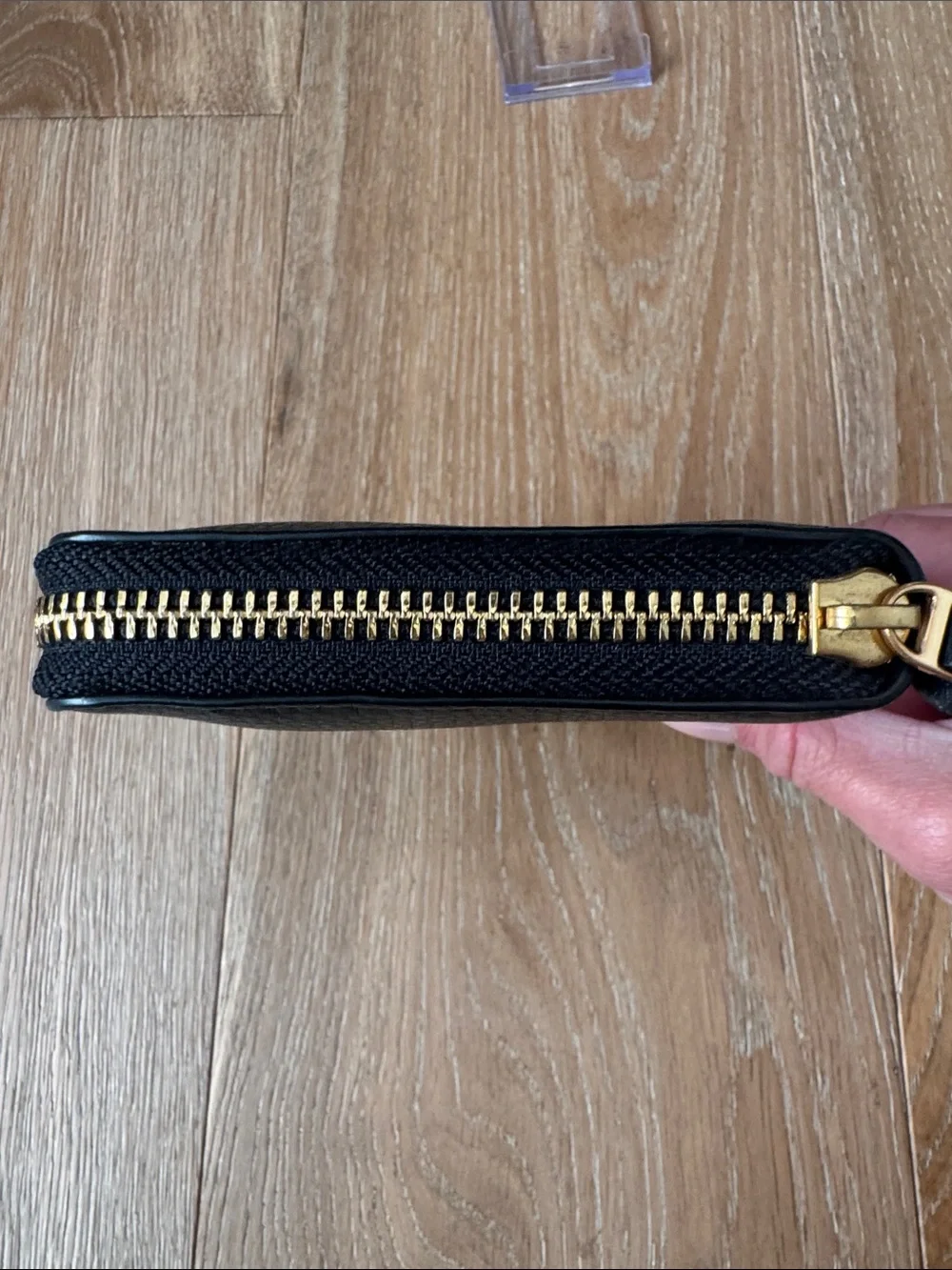 Tory Burch Black Leather Zip-Around Wallet with Gold Emblem